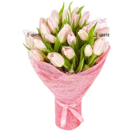 Send a bouquet of 25 pink tulips and greenery.