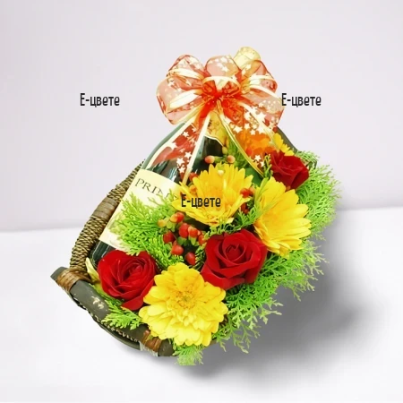 Доставка на гербери и червено вино в кошница