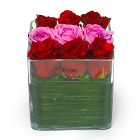 Send an arrangement  of roses and greenery.