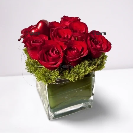 Send a romantic arrangement with roses.