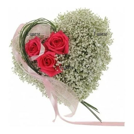 Send a flower arrangement - heart of gypsophila and roses.