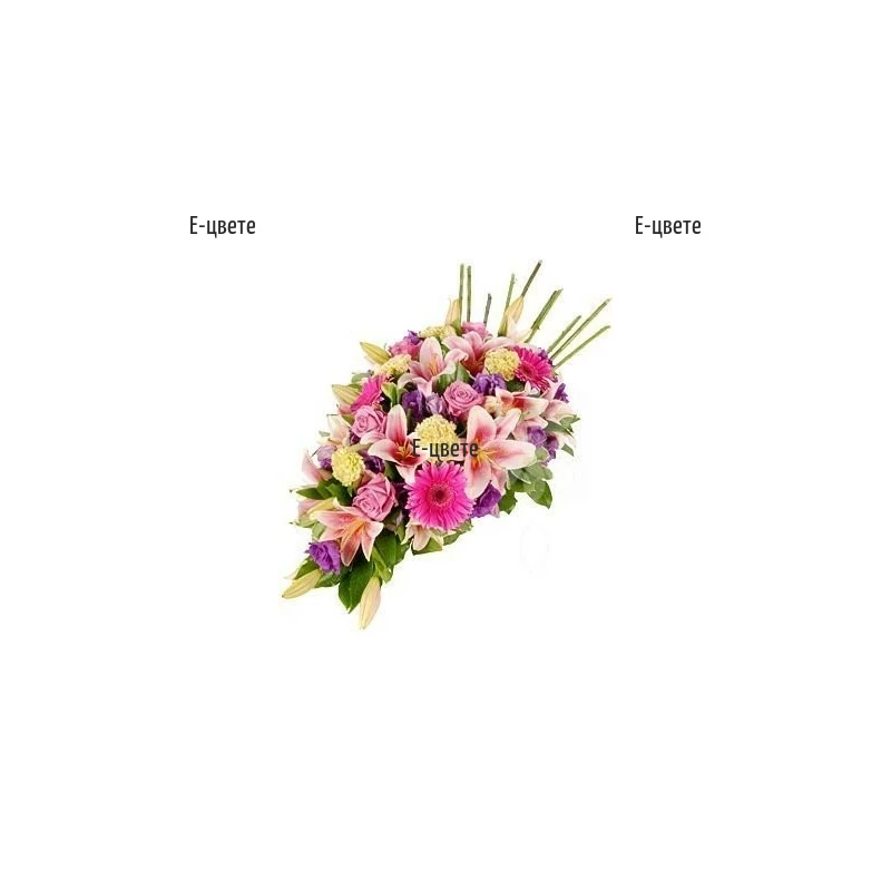 Send Funeral  arrangement of various flowers
