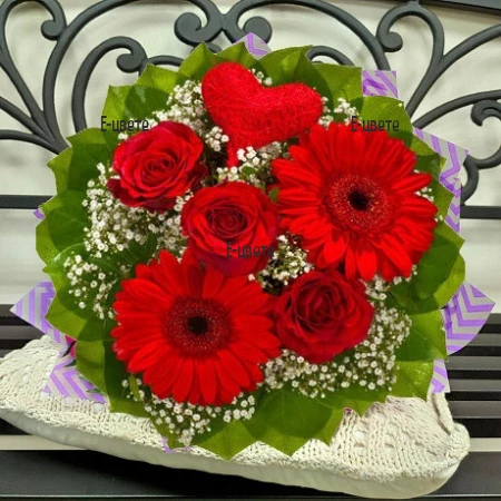 Send a romantic bouquet of red flowers.