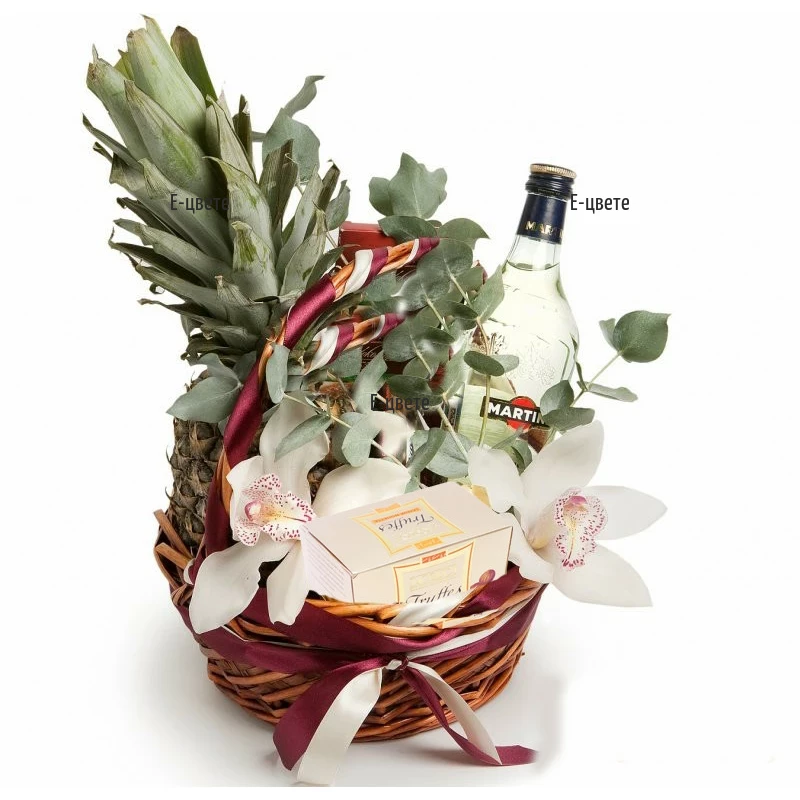 An online order and a delivery of a basket with gifts and flowers.