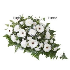Send funeral arrangement with white flowers