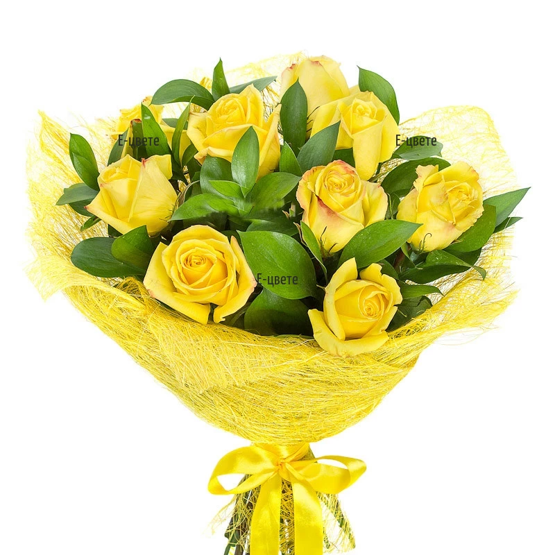 Flower delivery - a bouquet of yellow roses and greenery.