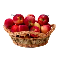 Online order and delivery of a basket with apples.