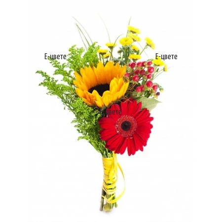 Modern summer bouquet of sunflowers and  gerberas