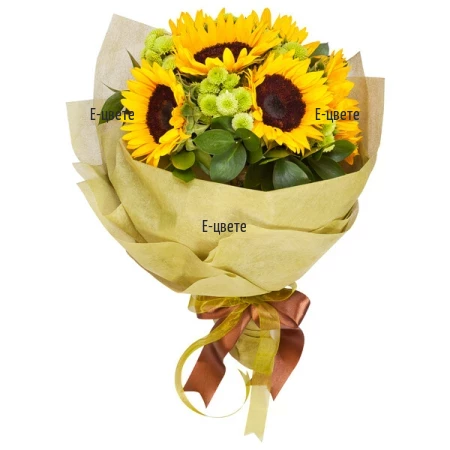 An online order and the delivery of a bouquet of sunflowers and flowers.