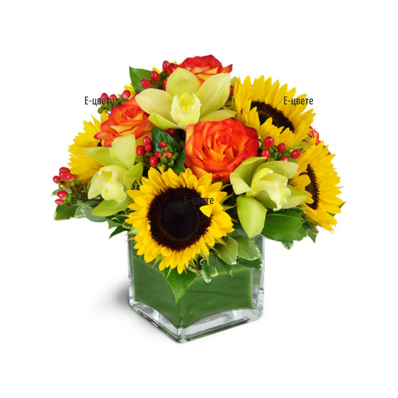 Send an arrangement of flowers on piaflora in glass cube.