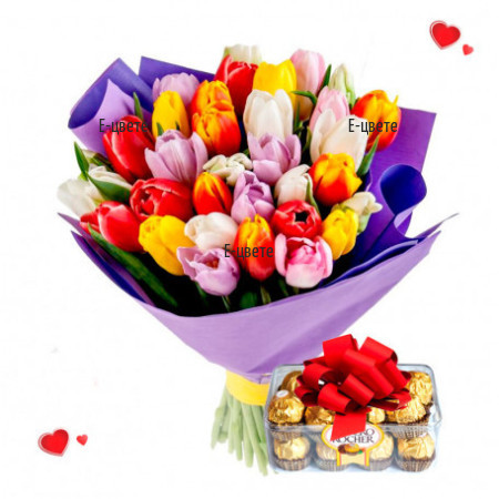 Bouquet of colorful tulips and Ferrero chocolates
