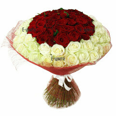 Online order of a luxurious bouquet of 101 white and red roses