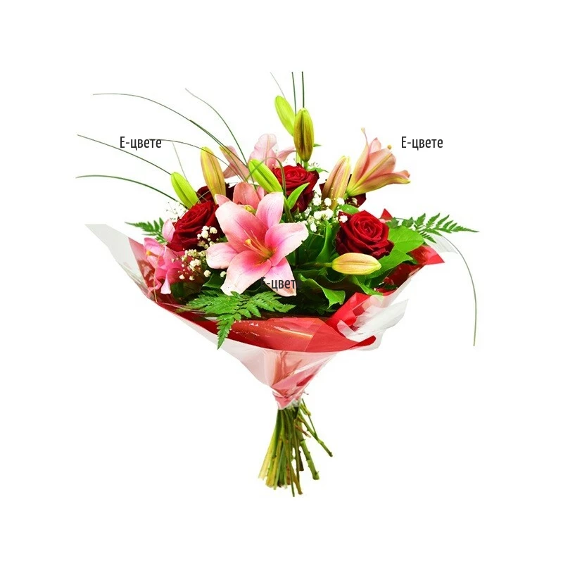 A beautiful and romantic bouquet of lilies roses and greenery