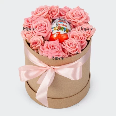 Flower delivery of roses and a Kinder egg in a hat box