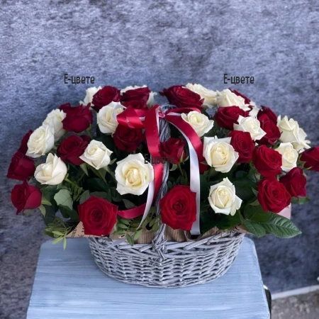 Send to Bulgaria 51 white and red roses in a basket