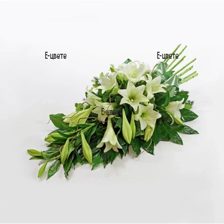 Order and delivery of funeral arrangement of lilies to Bulgaria