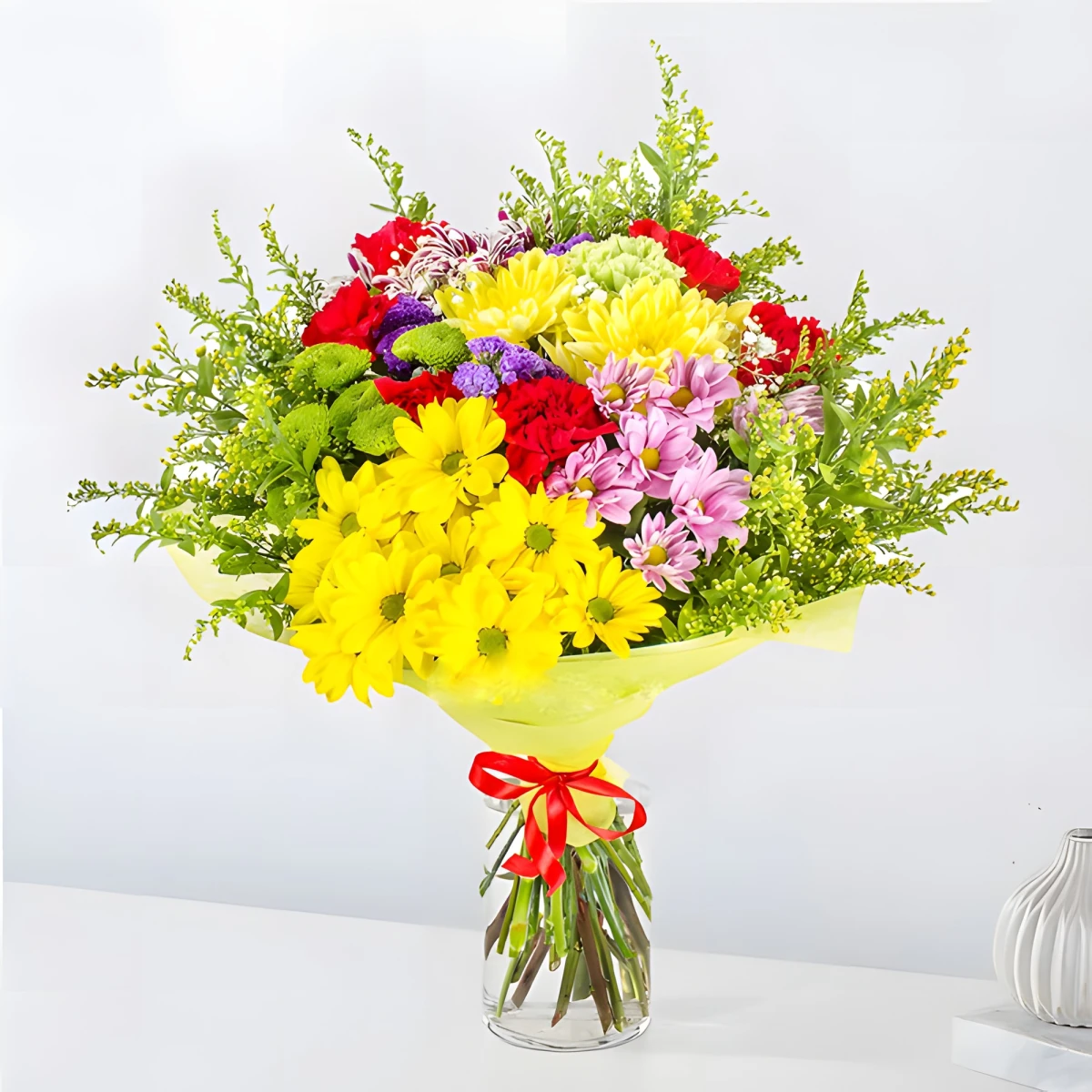 Send vibrant bouquet of colourful chrysanthemums and greenery