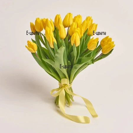 Send a bouquet of yellow tulips and spring flowers.