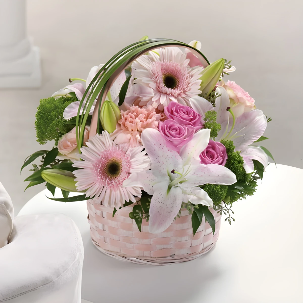Send a basket with pink flowers for the beloved one.
