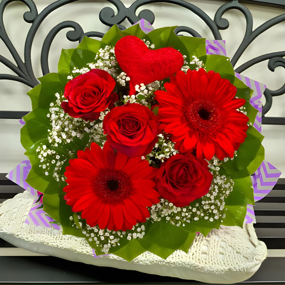 Send a romantic bouquet of red flowers.