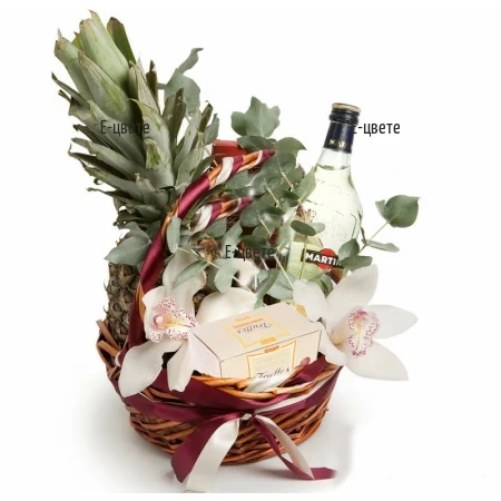 An online order and a delivery of a basket with gifts and flowers.