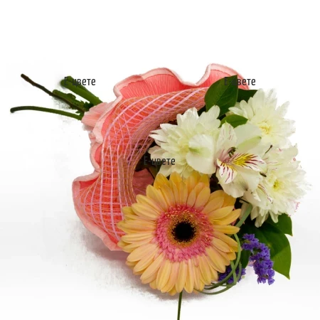 Send classic bouquet of flowers in soft colours.