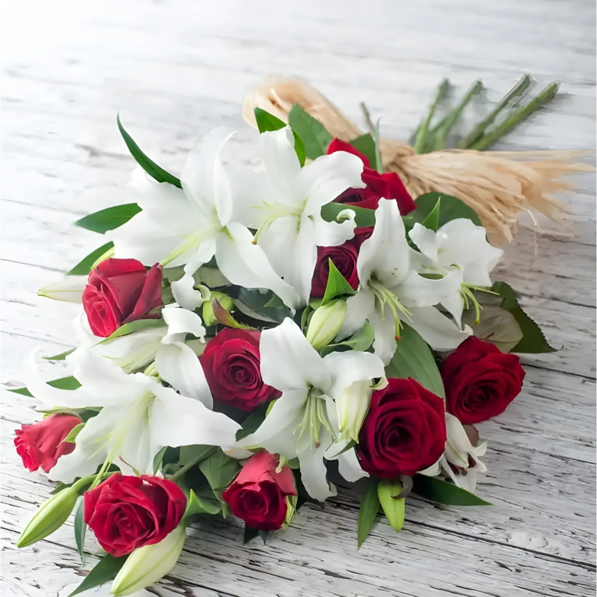 Send a bouquet of roses and lilies