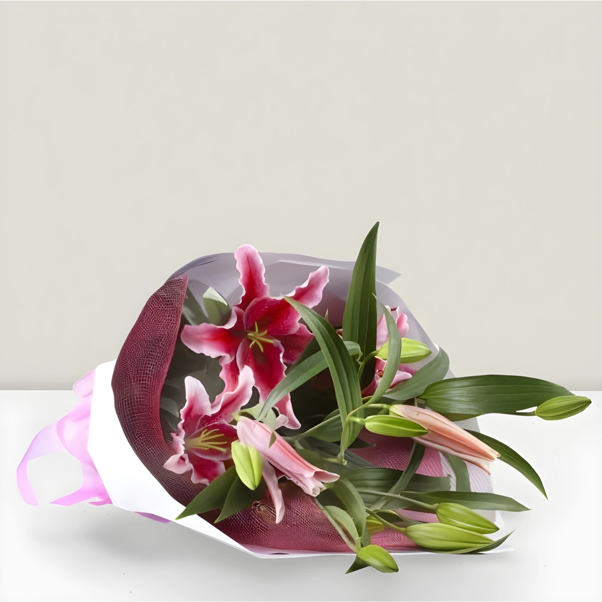 Send a bouquet of lilies and wrapping paper