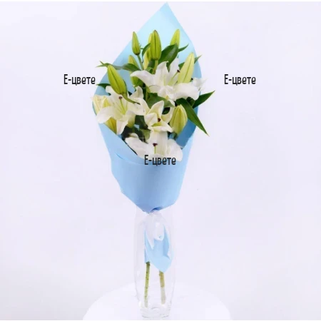 Send a boquet of white lilies and greenery by courier.