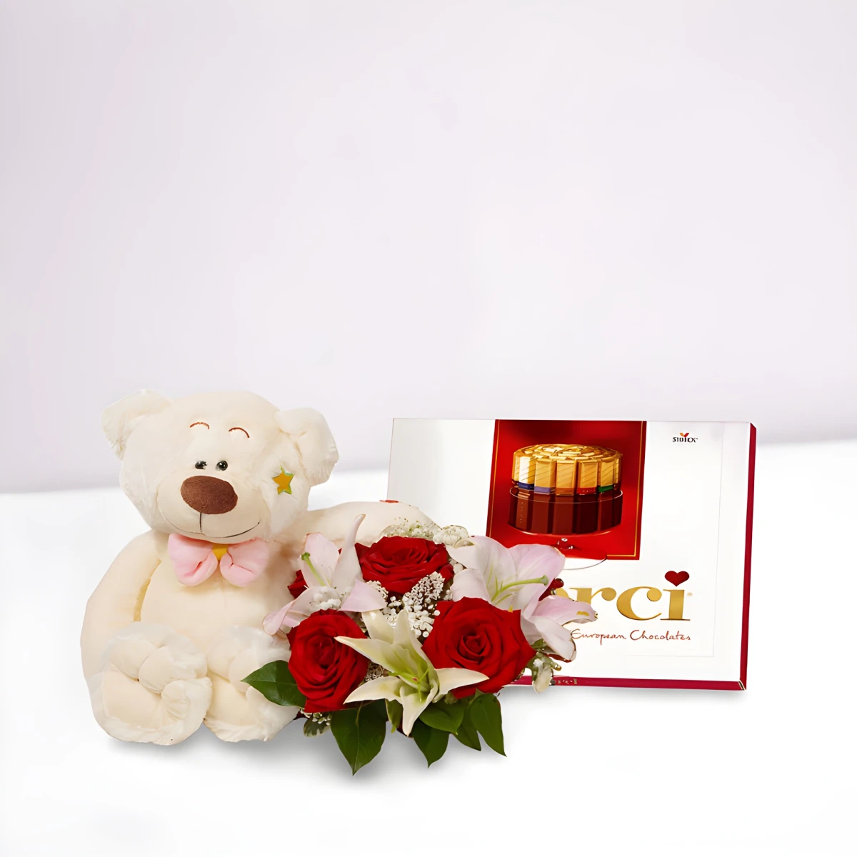 Romantic gift  - a bouquet of roses, a Teddy Bear and chocolates.
