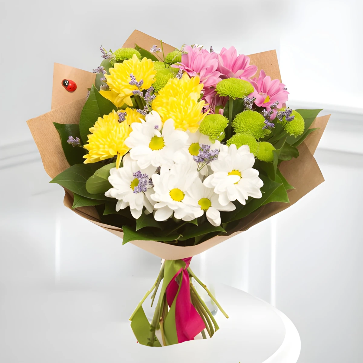 Send a bouquet of colourful  chrysanthemums and greenery.