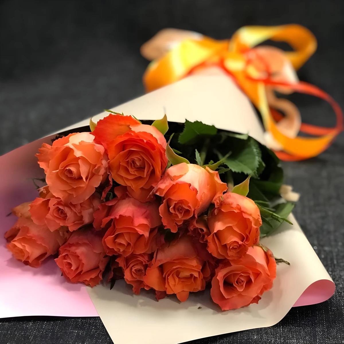 Send flowers directly to the recipient - a bouquet of orange roses.