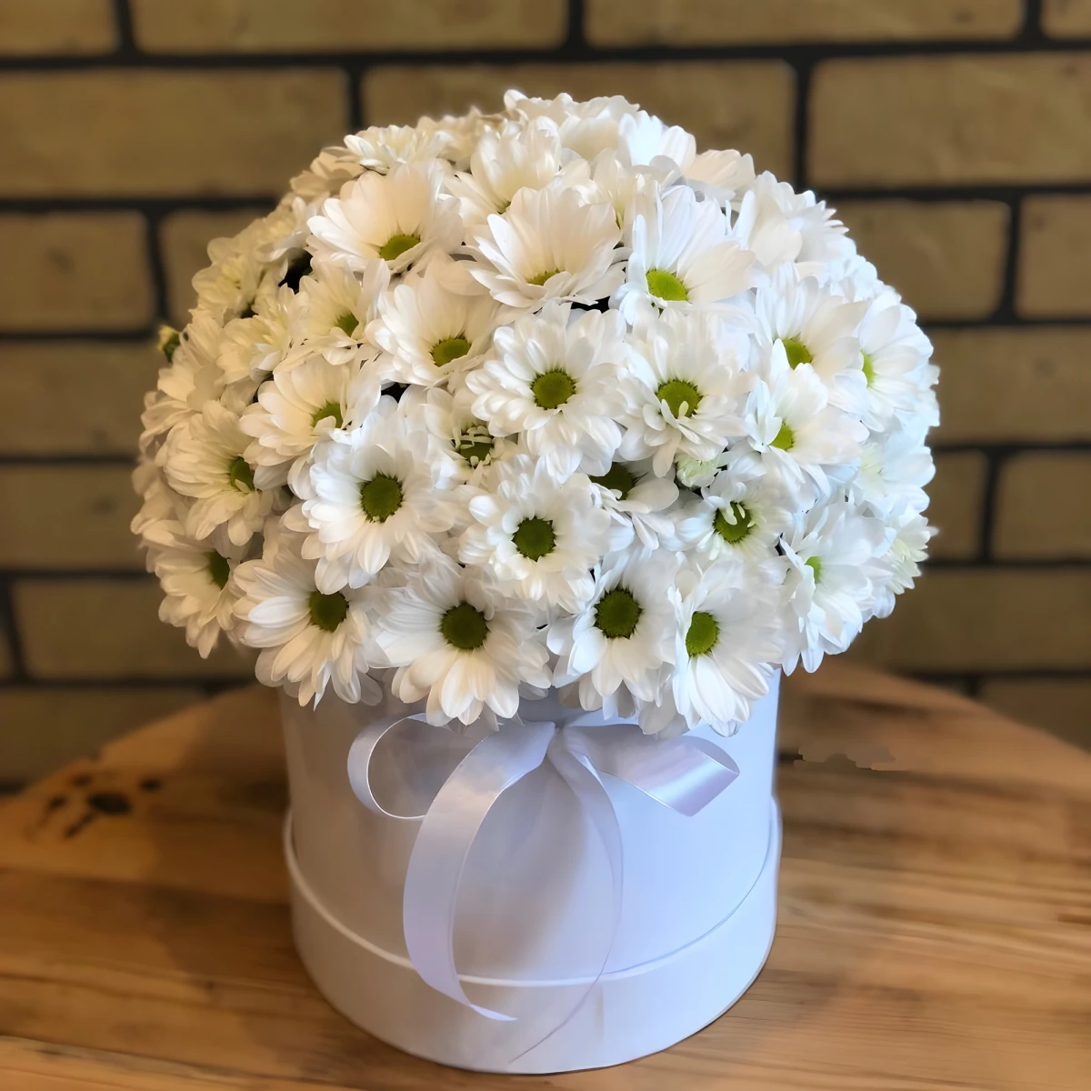 Delivery of a flower box with white chrysanthemums