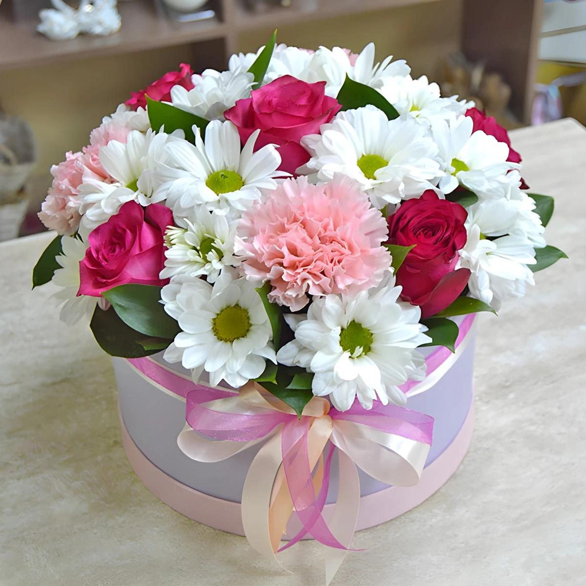 Delivery of a box of roses and flowers in Bulgaria