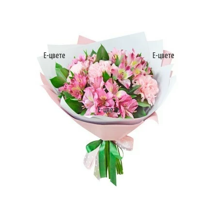 Delicate bouquet of alstroemerias and greenery