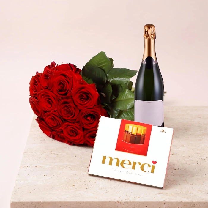 Поръчка на комплект от 13 червени рози с бонбони Merci