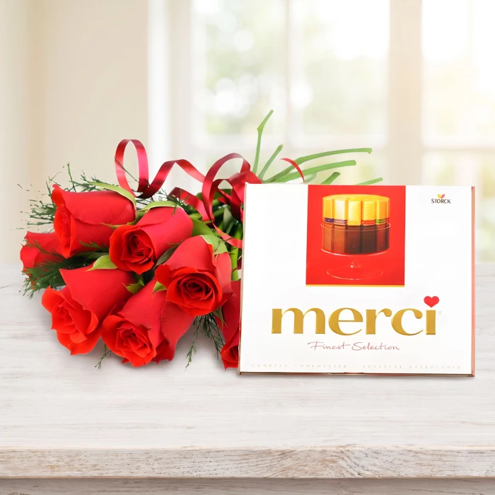 7 червени рози и бонбони Merci за романтичен жест